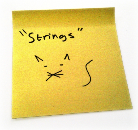 a postit with the word 'strings' on it